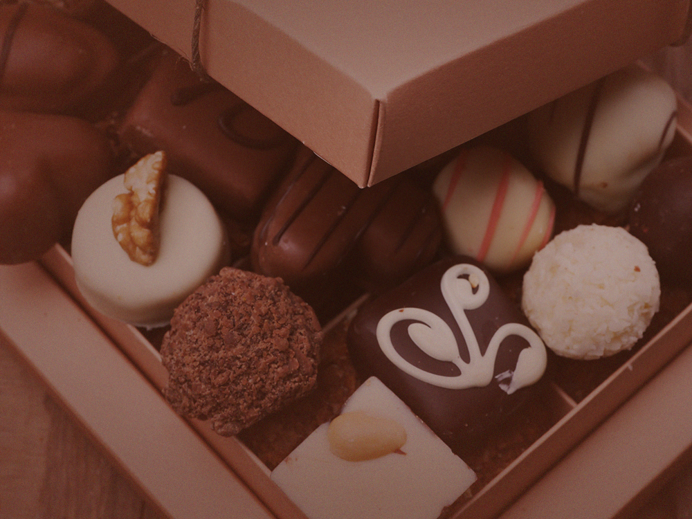 Fotografia ilustrativa de bombons recheados - chocolate no dia dos pais
